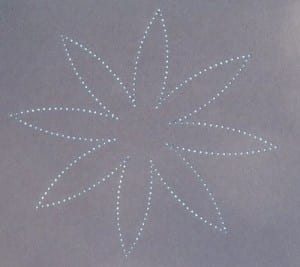 photo-6-punched-flower-held-to-light_resize